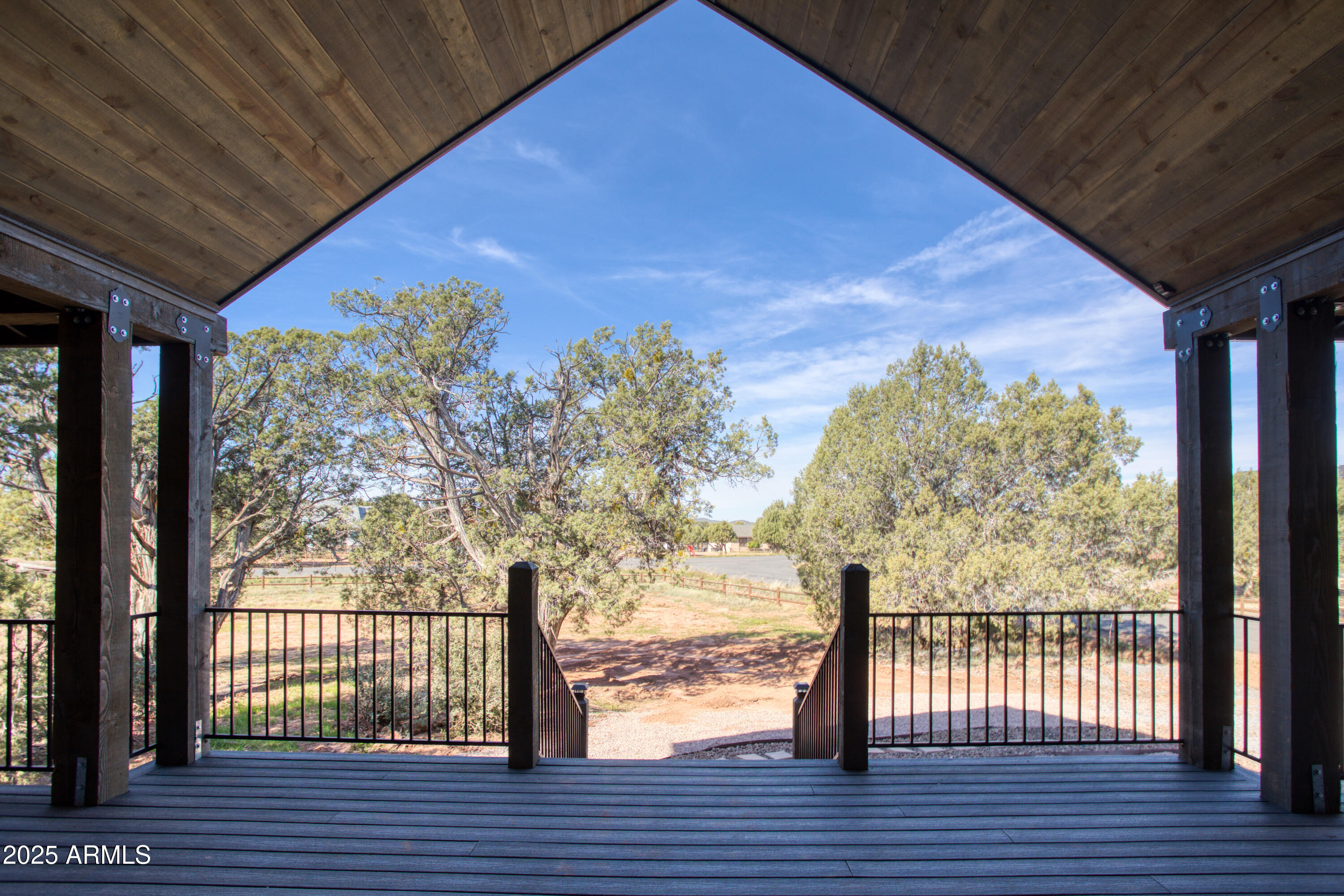 957 Cheney Ranch Loop Show Low, AZ 85901 - Photo 8 of 32 a view of balcony with wooden floor and fence