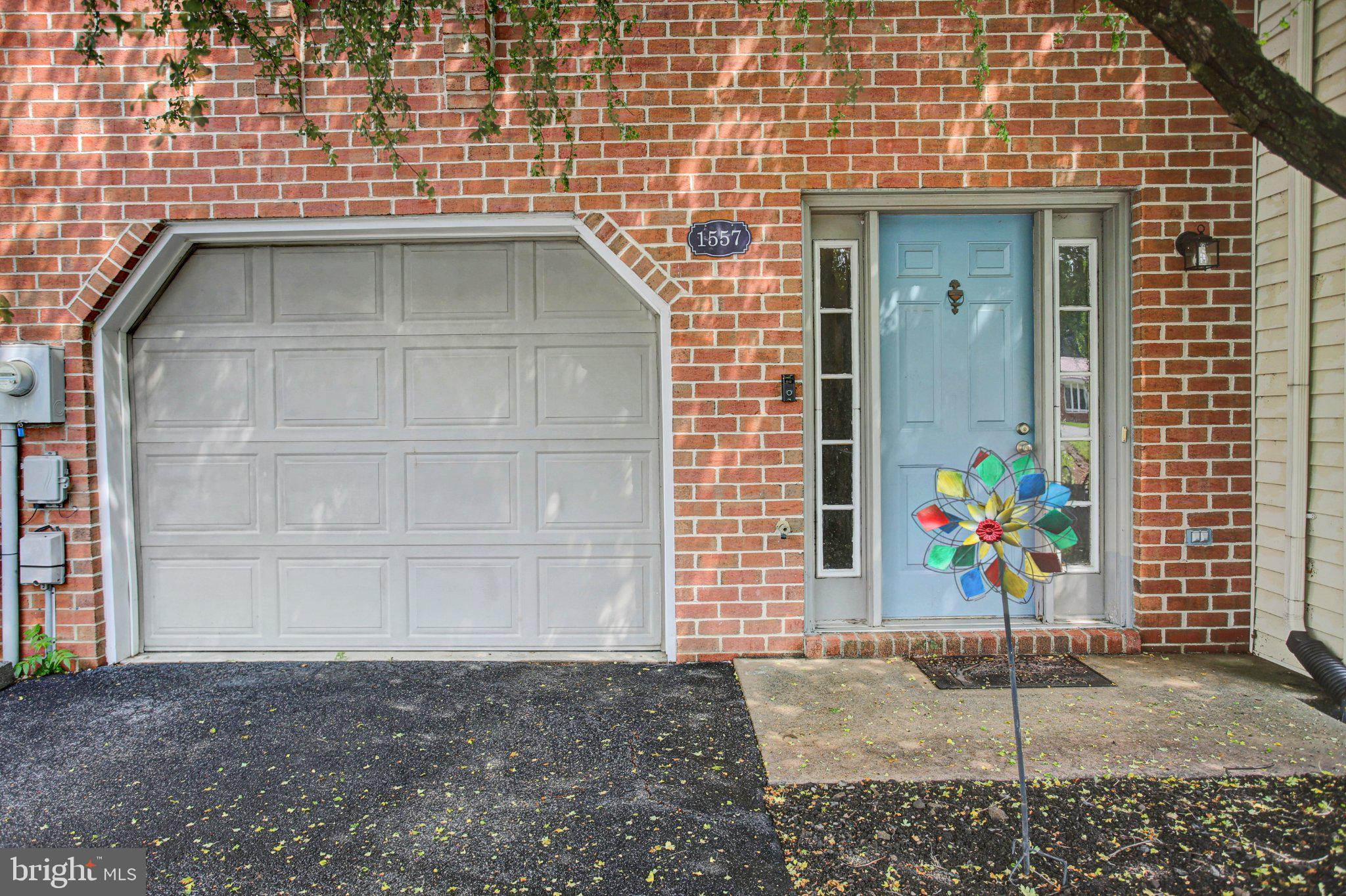 1557 Brechbill Road Chambersburg, PA 17202 - Photo 4 of 33 Charming brick facade with vibrant accents.