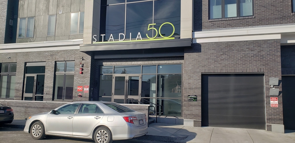 a car parked in front of a building