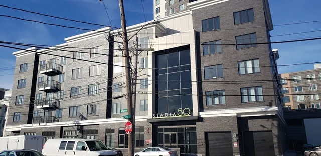 a view of a building with a street