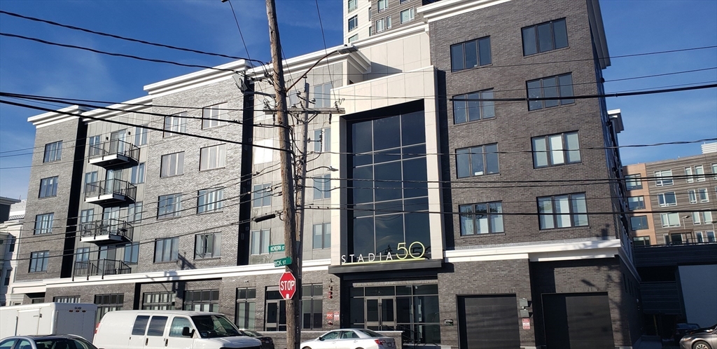50 Hichborn Street, Unit 311 Boston, MA 02135 - Photo 2 of 19 a view of a building with a street