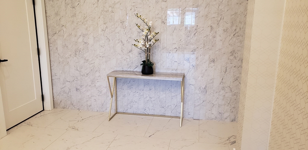 50 Hichborn Street, Unit 311 Boston, MA 02135 - Photo 4 of 19 a view of a door in a bathroom