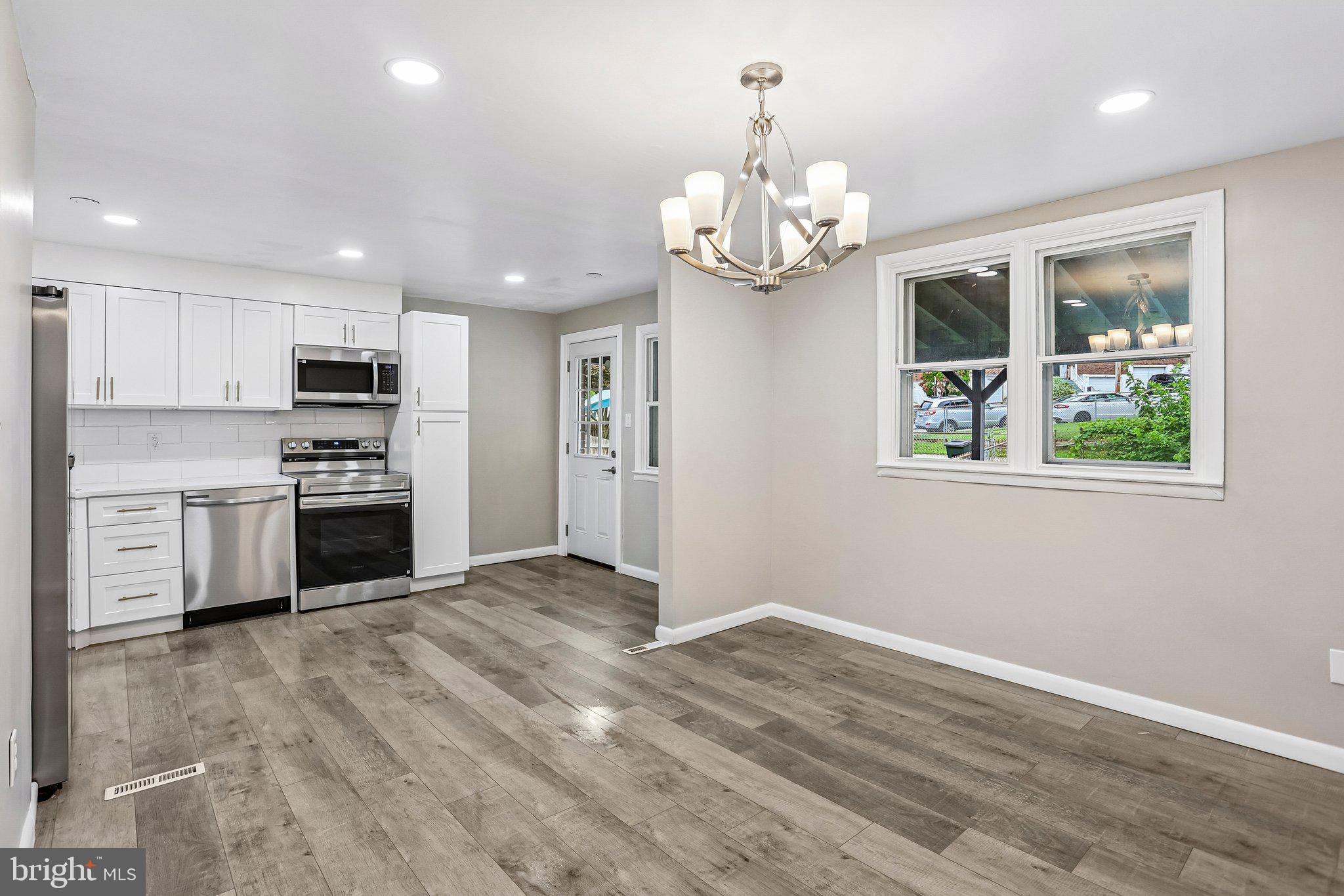 4008 Powell Road Brookhaven, PA 19015 - Photo 6 of 34 Modern kitchen with natural light.