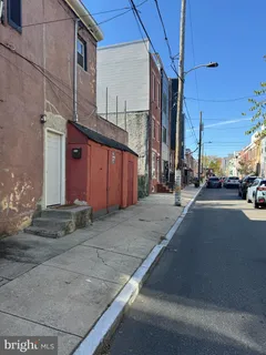 a view of a street with cars