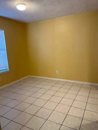 a view of a room with a window