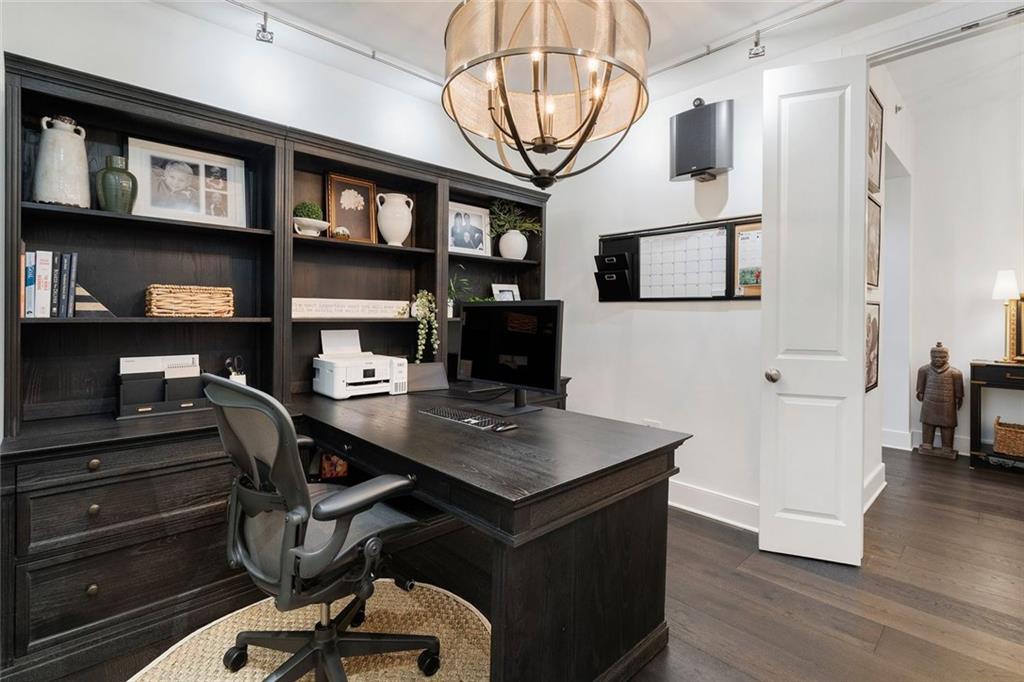 3630 Peachtree Road Northeast, Unit 2104 Atlanta, GA 30326 - Photo 37 of 98 a view of a workspace with furniture