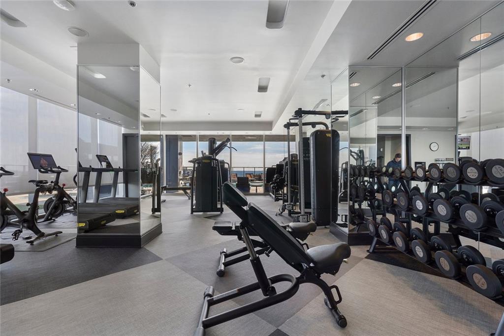 3630 Peachtree Road Northeast, Unit 2104 Atlanta, GA 30326 - Photo 86 of 98 a view of a room with gym equipment