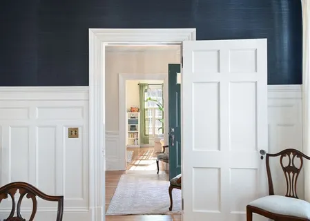 a living room with furniture and a gate