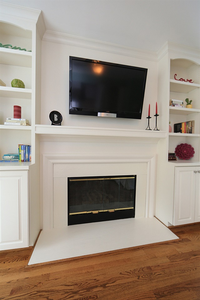 9712 Miranda Drive Raleigh, NC 27617 - Photo 6 of 25 Curl up to a good book or watch your favorite show in front of a warm and cozy fire. Note that the television above the fireplace conveys at no additional cost! Gas fireplace