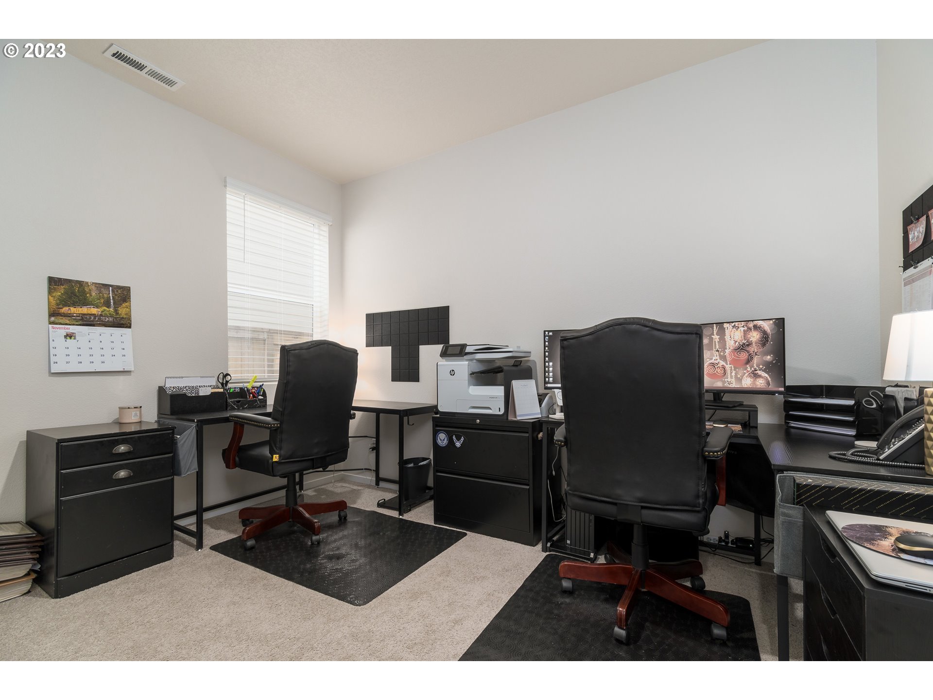 2914 Fenya Street Springfield, OR 97477 - Photo 17 of 35 a view of a workspace with furniture and a window