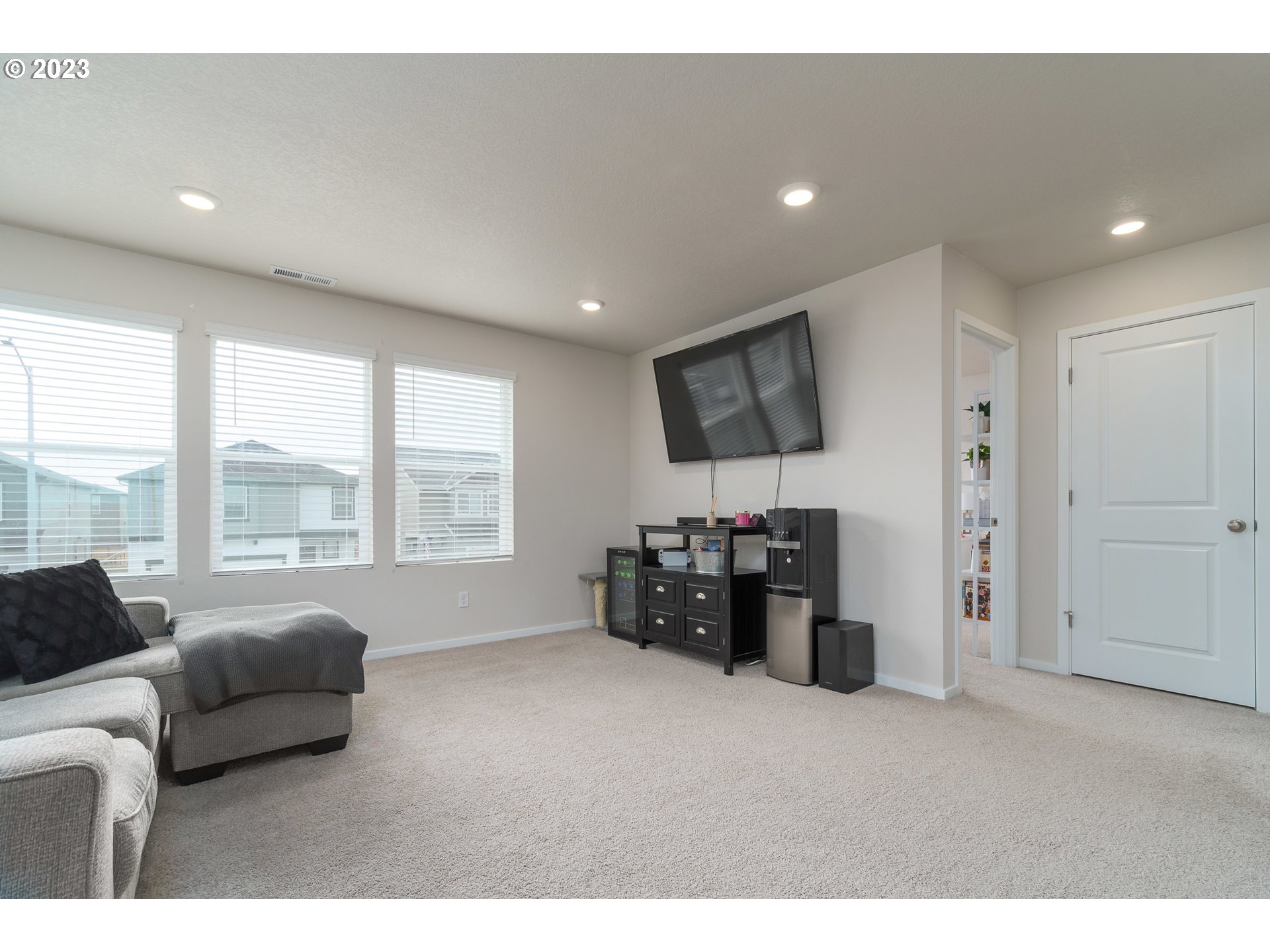 2914 Fenya Street Springfield, OR 97477 - Photo 20 of 35 a living room with furniture and a flat screen tv