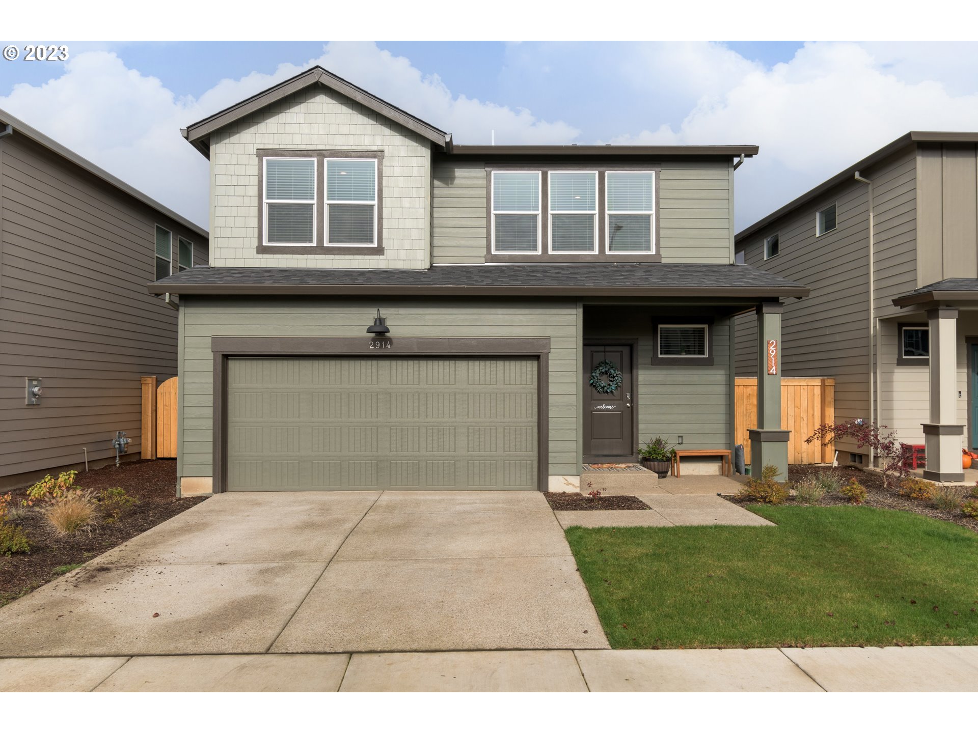 2914 Fenya Street Springfield, OR 97477 - Photo 2 of 35 a front view of a house with a yard and garage