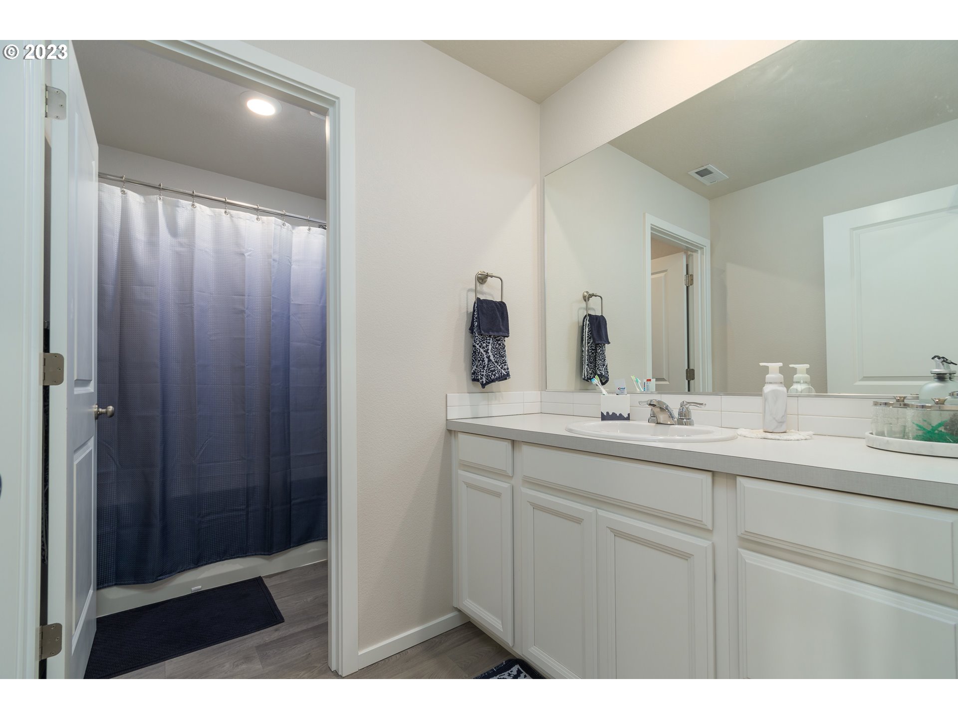 2914 Fenya Street Springfield, OR 97477 - Photo 26 of 35 a bathroom with a double vanity sink and mirror