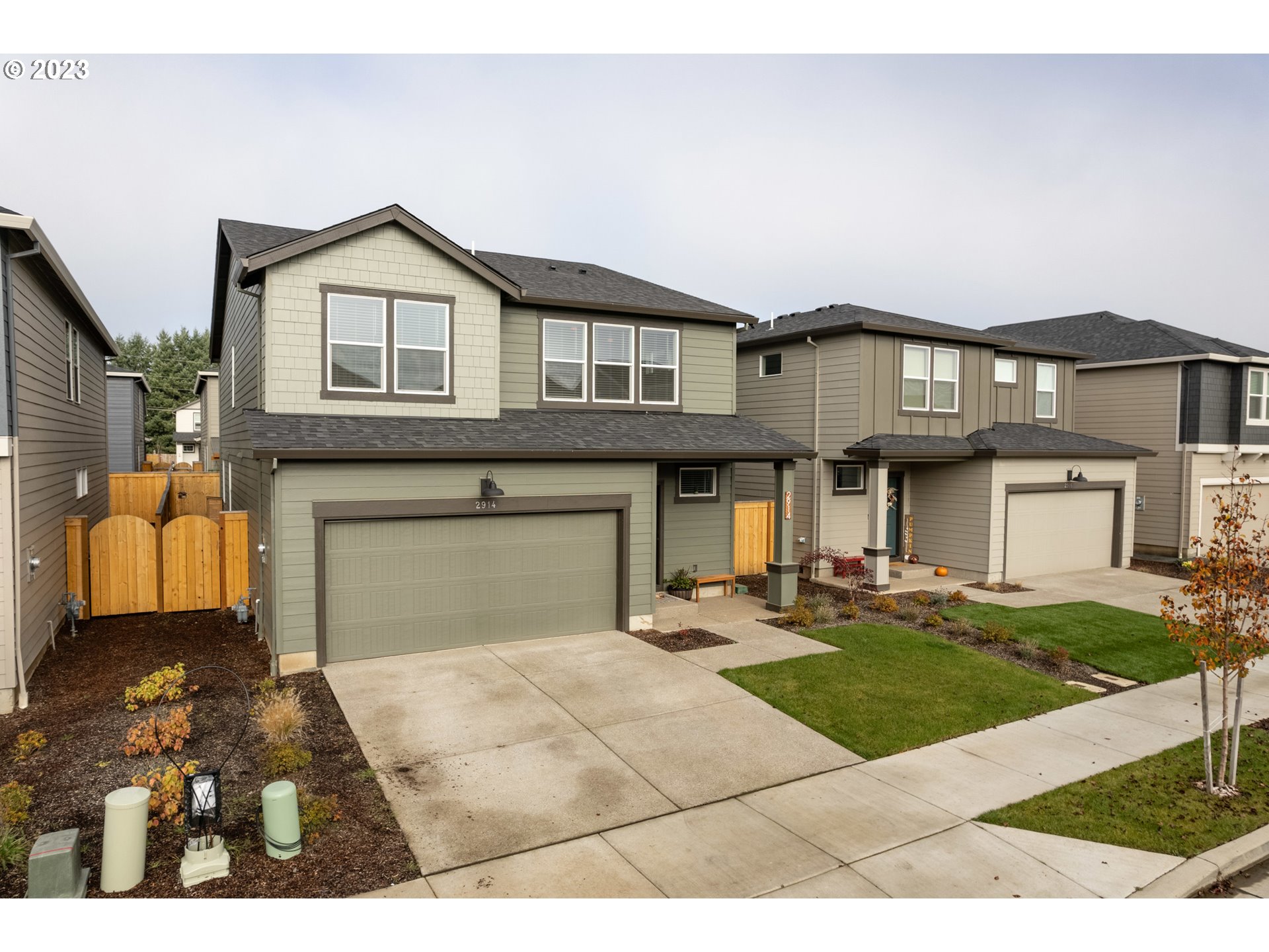2914 Fenya Street Springfield, OR 97477 - Photo 3 of 35 a front view of a house with a yard and garage