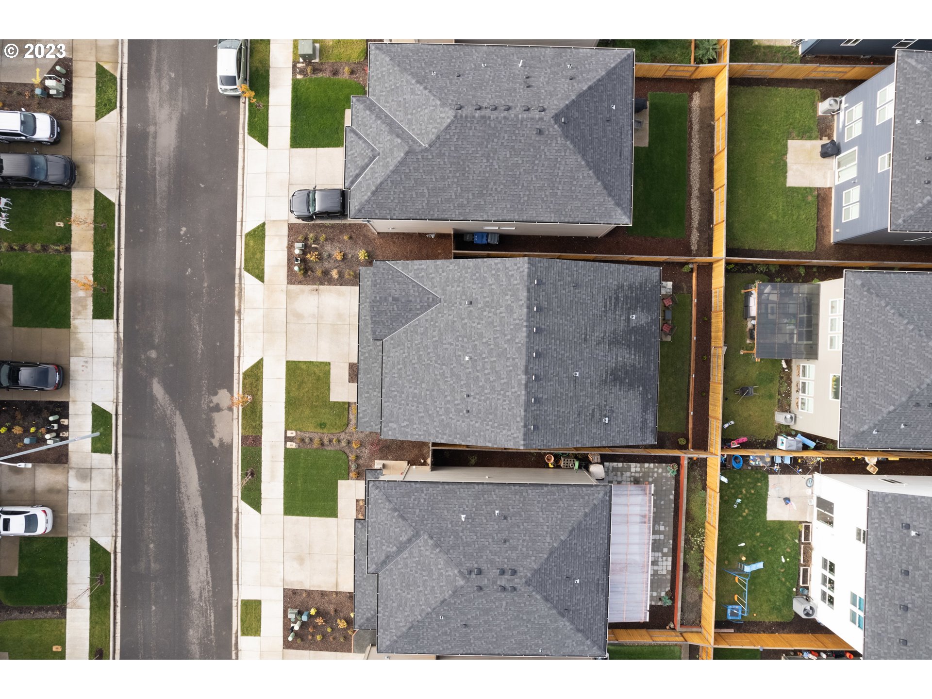 2914 Fenya Street Springfield, OR 97477 - Photo 33 of 35 an aerial view of houses with an outdoor space and seating