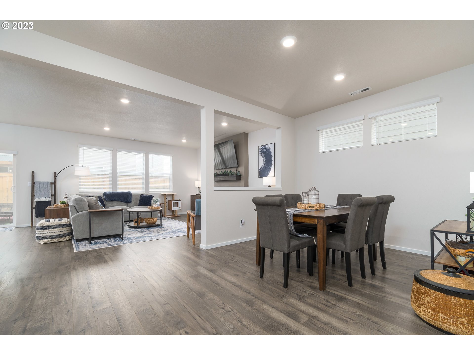 2914 Fenya Street Springfield, OR 97477 - Photo 5 of 35 a view of a dining room with furniture and wooden floor
