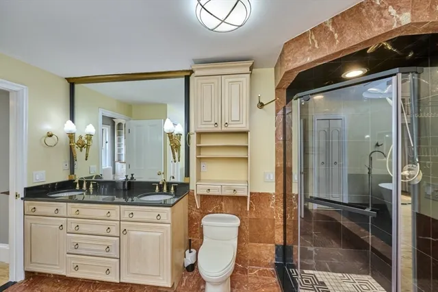 a view of a pathway with a garden