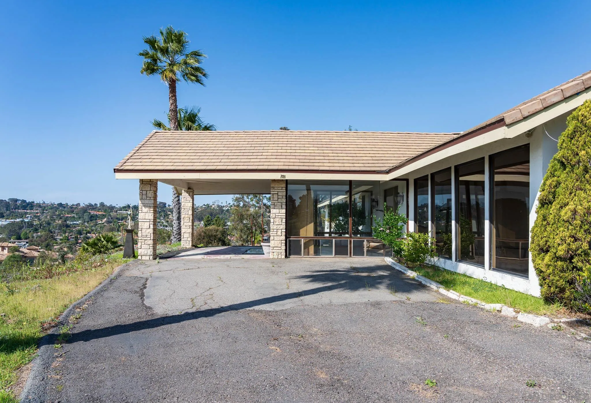 18024 Avenida Alondra Rancho Santa Fe, CA 92067 - Photo 13 of 25 a porch with yard table and chairs