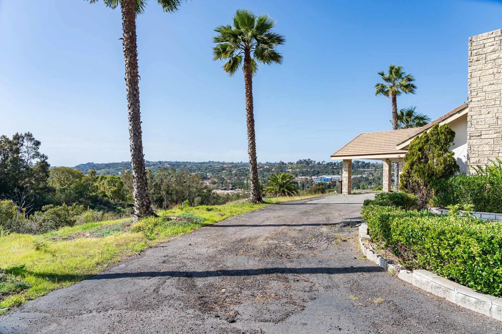 18024 Avenida Alondra Rancho Santa Fe, CA 92067 - Photo 16 of 25 a view of a street with potted plants
