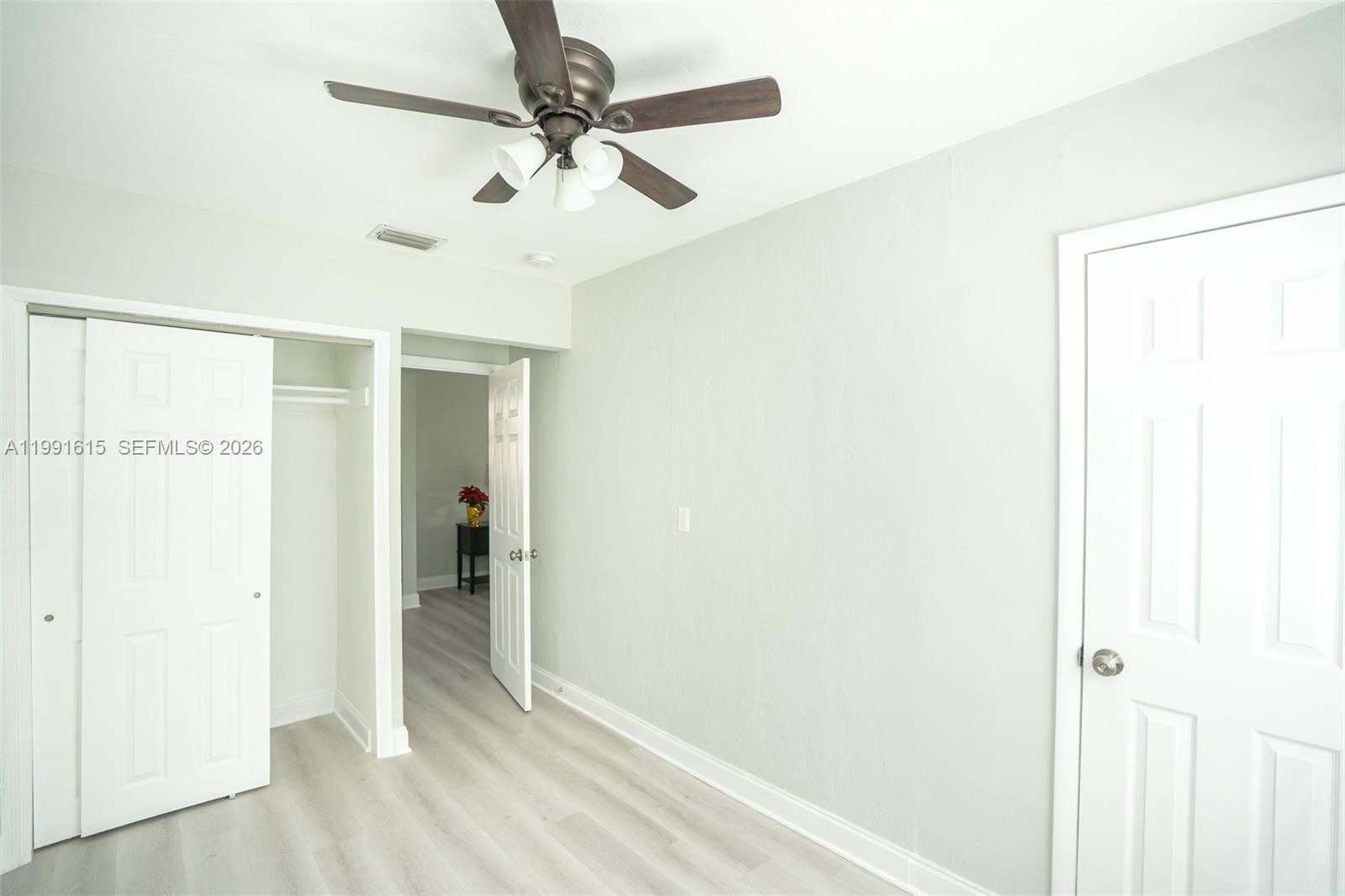 2230 Southwest 60th Court Miami, FL 33155 - Photo 31 of 35 a view of a hallway with wooden floor