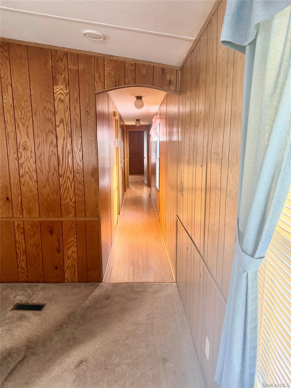 63 Tanglewood Road Hopewell Junction, NY 12533 - Photo 13 of 25 a view of a hallway with painted walls