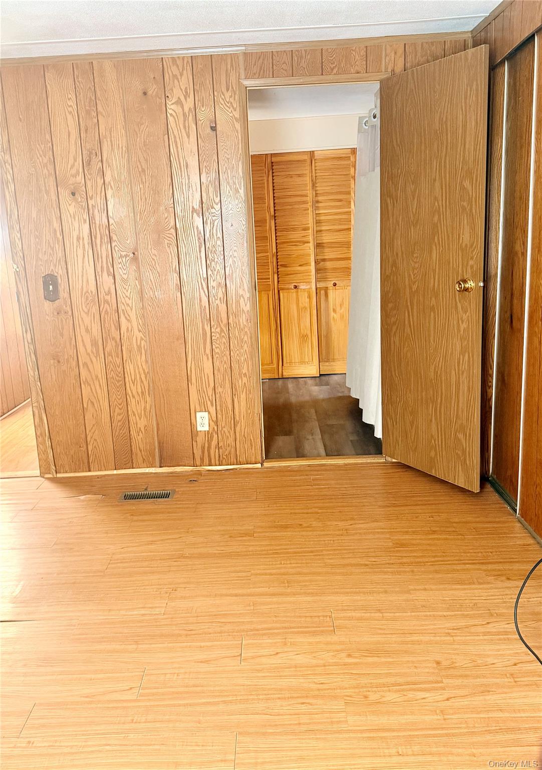 63 Tanglewood Road Hopewell Junction, NY 12533 - Photo 18 of 25 a view of a room with a wooden door