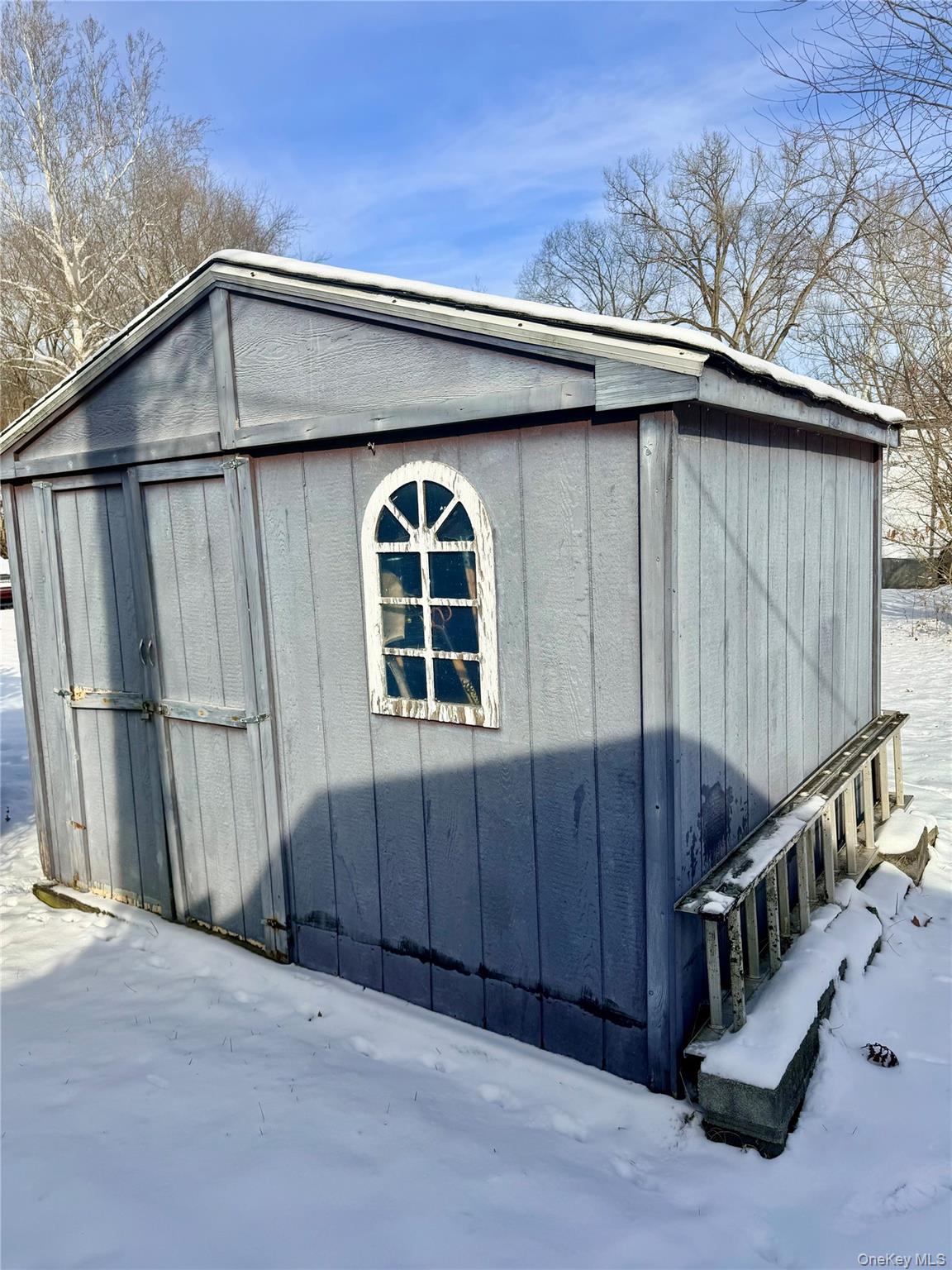 63 Tanglewood Road Hopewell Junction, NY 12533 - Photo 23 of 25 a view of a house with wooden fence