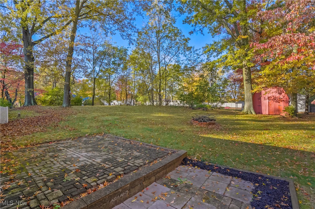 3768 Greenfield Road Uniontown, OH 44685 - Photo 28 of 38 brick back patio