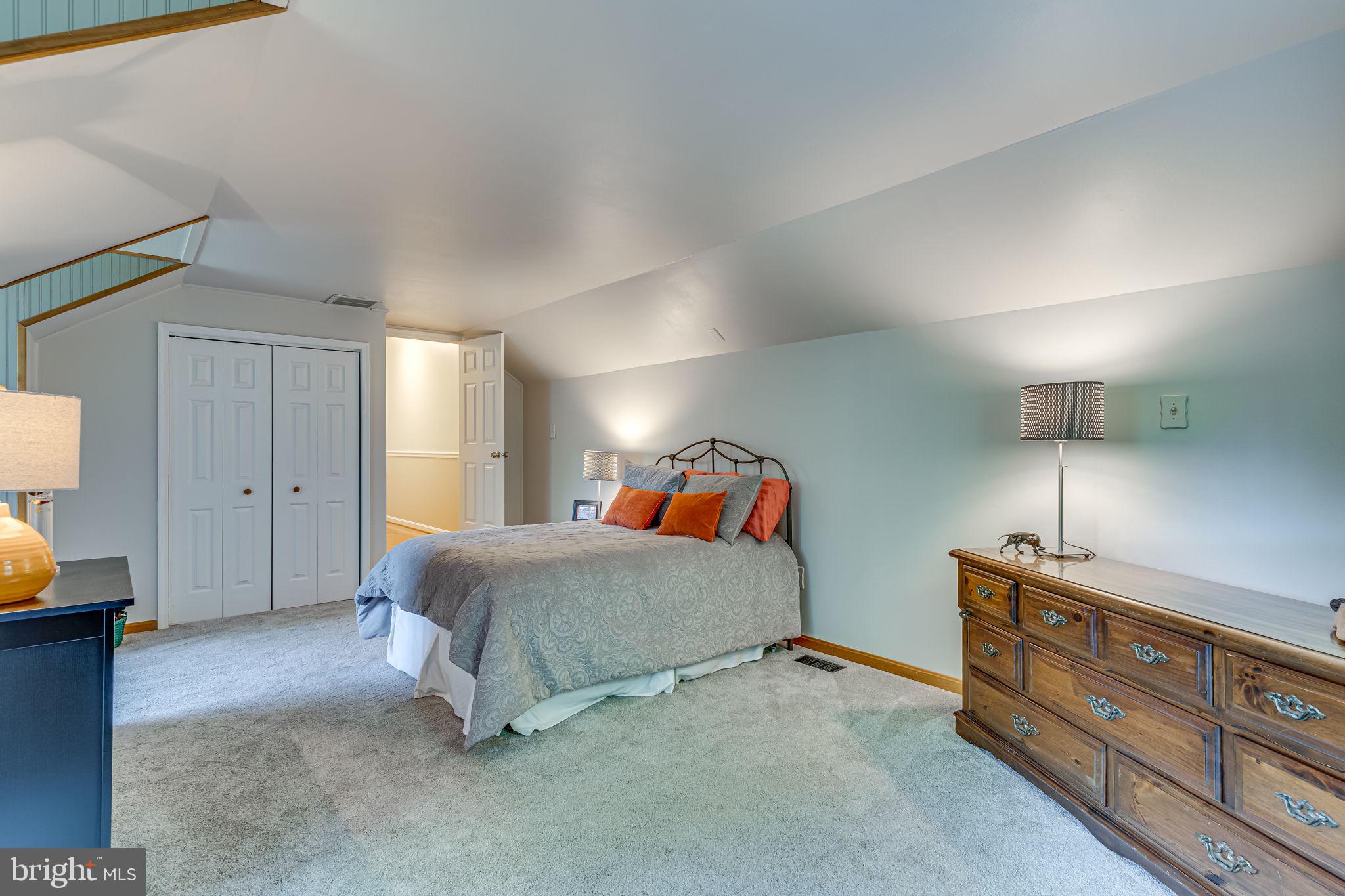 9741 Howes Road Dunkirk, MD 20754 - Photo 29 of 48 a bedroom with a bed and a window