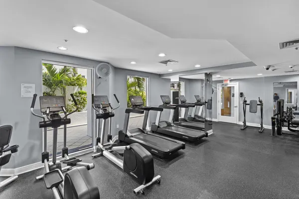a view of a room with gym equipment