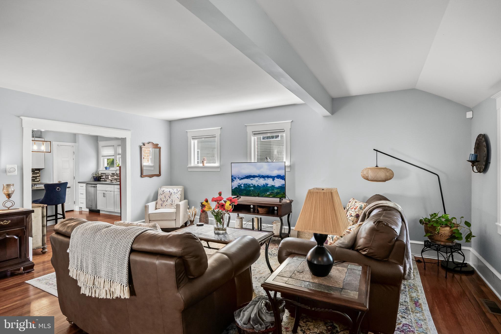 615 North Walnut Avenue Magnolia, NJ 08049 - Photo 5 of 40 a living room with furniture chess table and a mirror