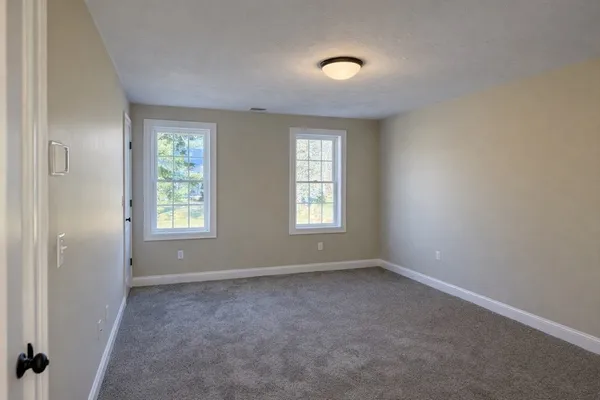 an empty room with a natural light