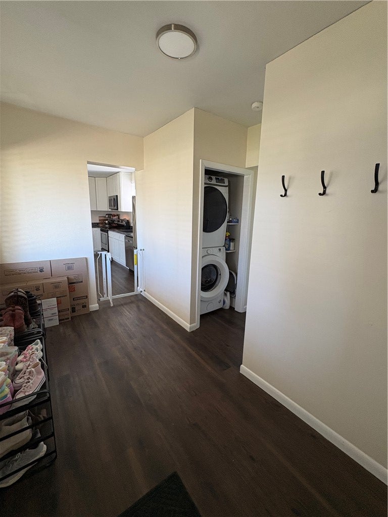 1513 Ridgeway Drive Springfield, OH 45506 - Photo 8 of 53 This laundry area features modern appliances and durable flooring, optimizing functionality and aesthetic appeal.