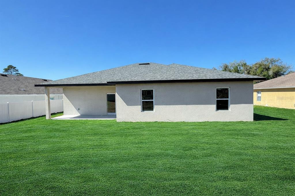 15227 Southwest 28th Avenue Road Ocala, FL 34473 - Photo 36 of 38 a house view with a garden space