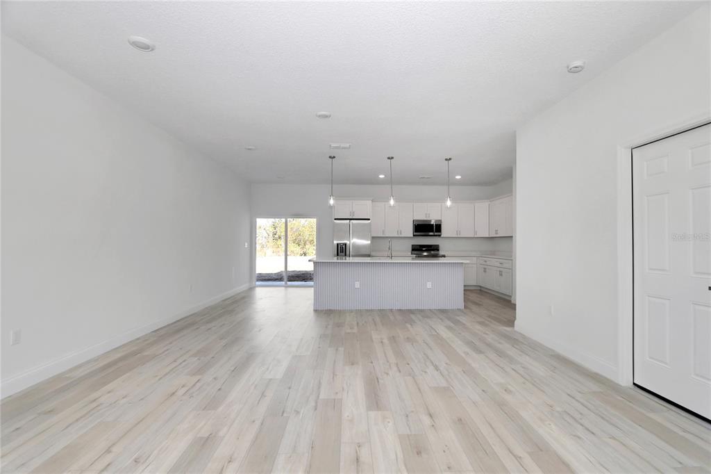 15227 Southwest 28th Avenue Road Ocala, FL 34473 - Photo 6 of 38 a view of kitchen with wooden floor