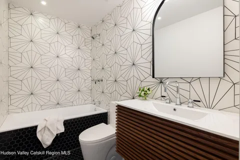 a bathroom with a sink and a toilet