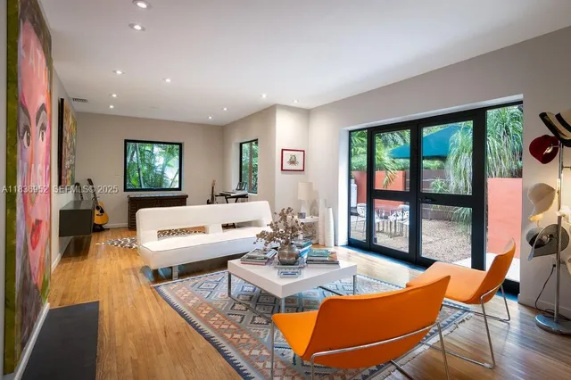 a living room with furniture and a table