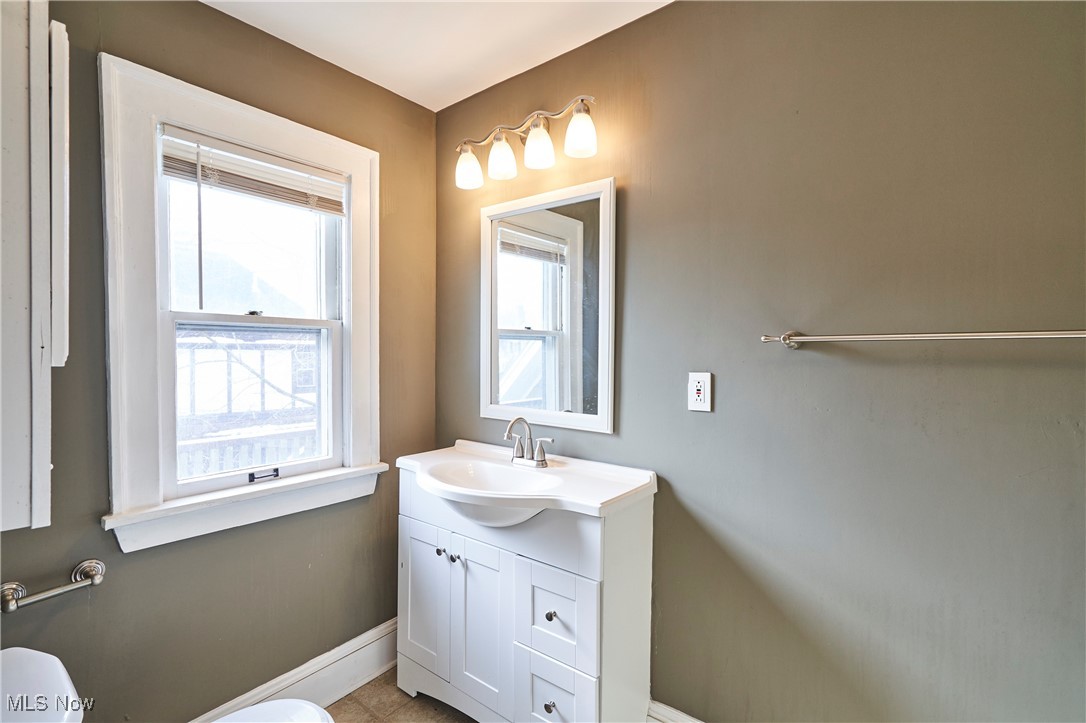 2152 Middlefield Road Cleveland, OH 44106 - Photo 19 of 50 Bathroom featuring vanity and toilet