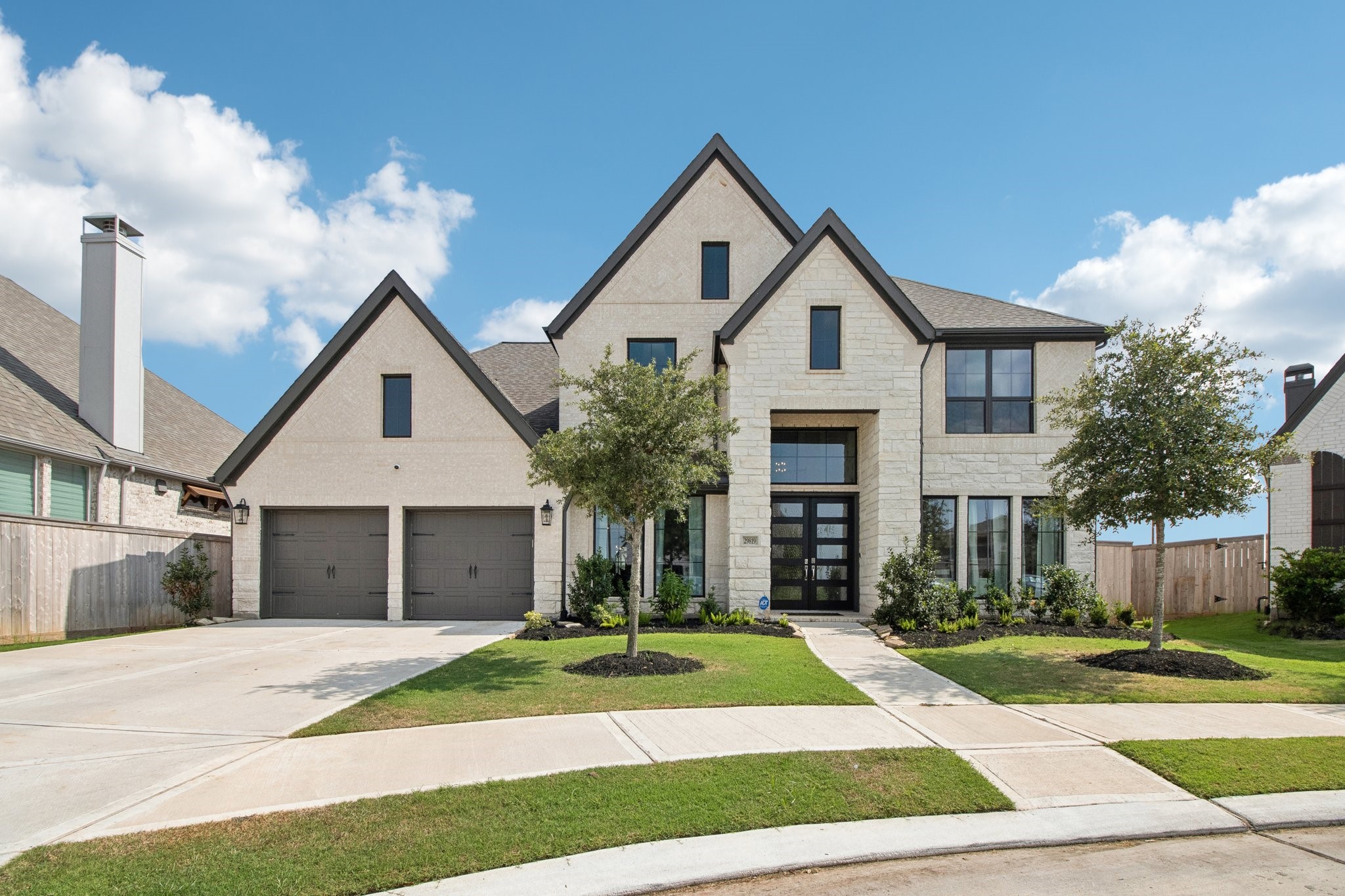 29819 Autumn Maple Court Fulshear, TX 77494 - Photo 1 of 47 a front view of a house with a yard and garage