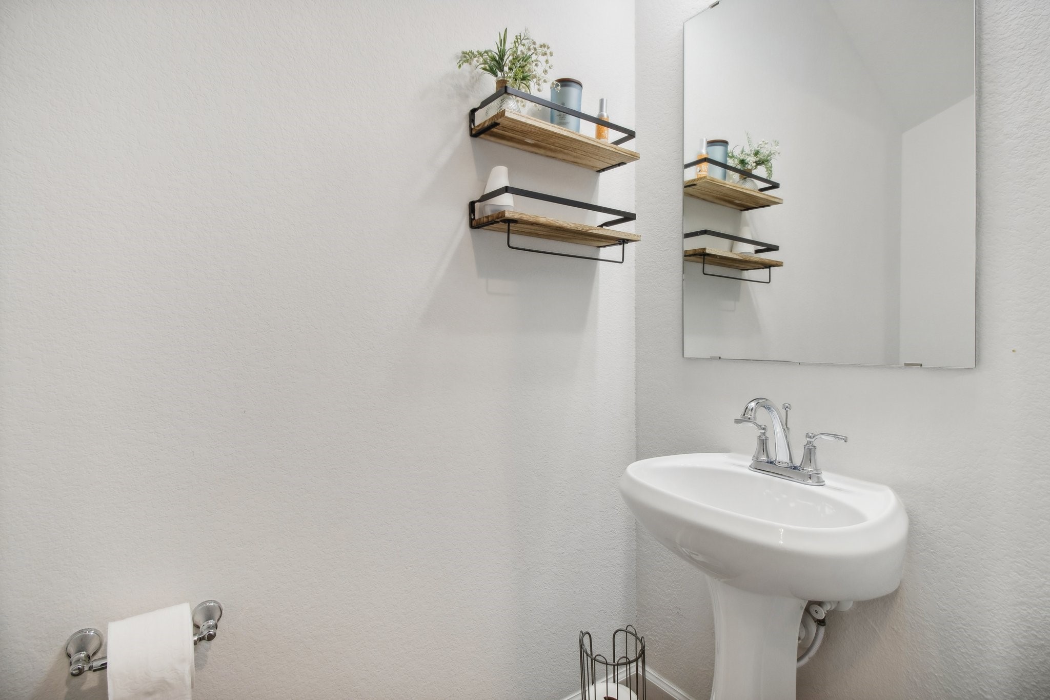 29819 Autumn Maple Court Fulshear, TX 77494 - Photo 18 of 47 a bathroom with a sink and mirror