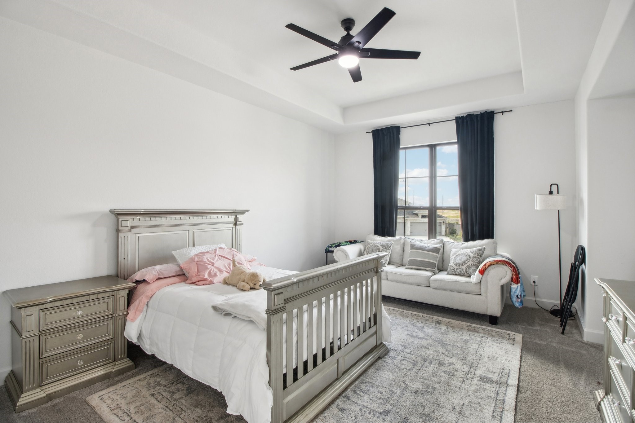 29819 Autumn Maple Court Fulshear, TX 77494 - Photo 32 of 47 a bedroom with a bed and a window