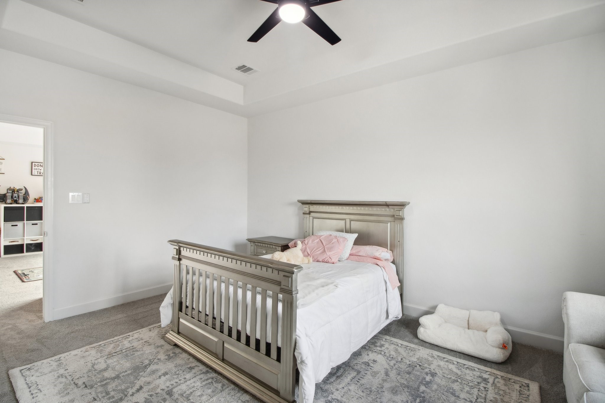 29819 Autumn Maple Court Fulshear, TX 77494 - Photo 33 of 47 a bedroom with a bed and a table