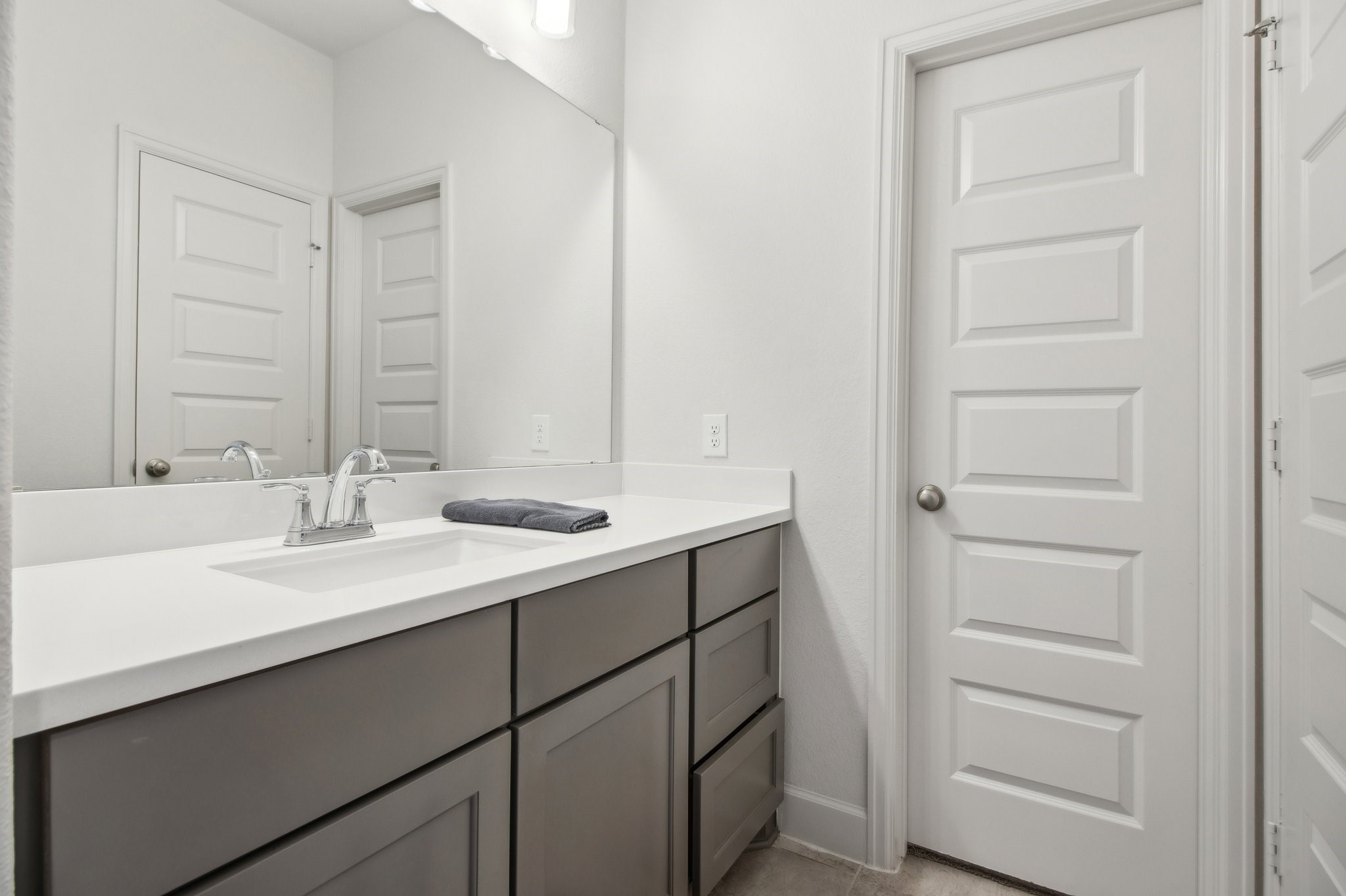 29819 Autumn Maple Court Fulshear, TX 77494 - Photo 37 of 47 a bathroom with a sink and a mirror