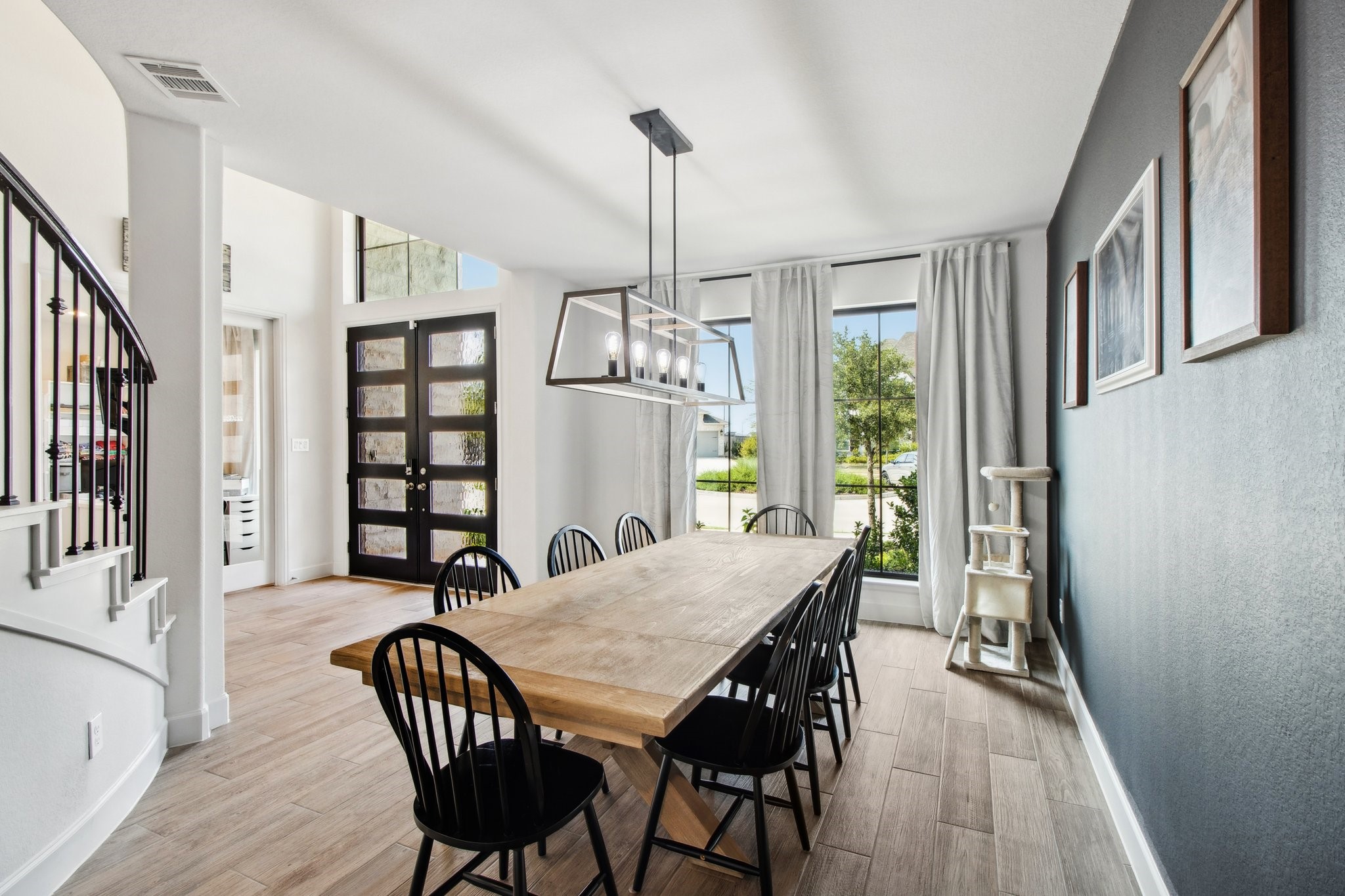 29819 Autumn Maple Court Fulshear, TX 77494 - Photo 9 of 47 a view of a dining room with furniture window and wooden floor