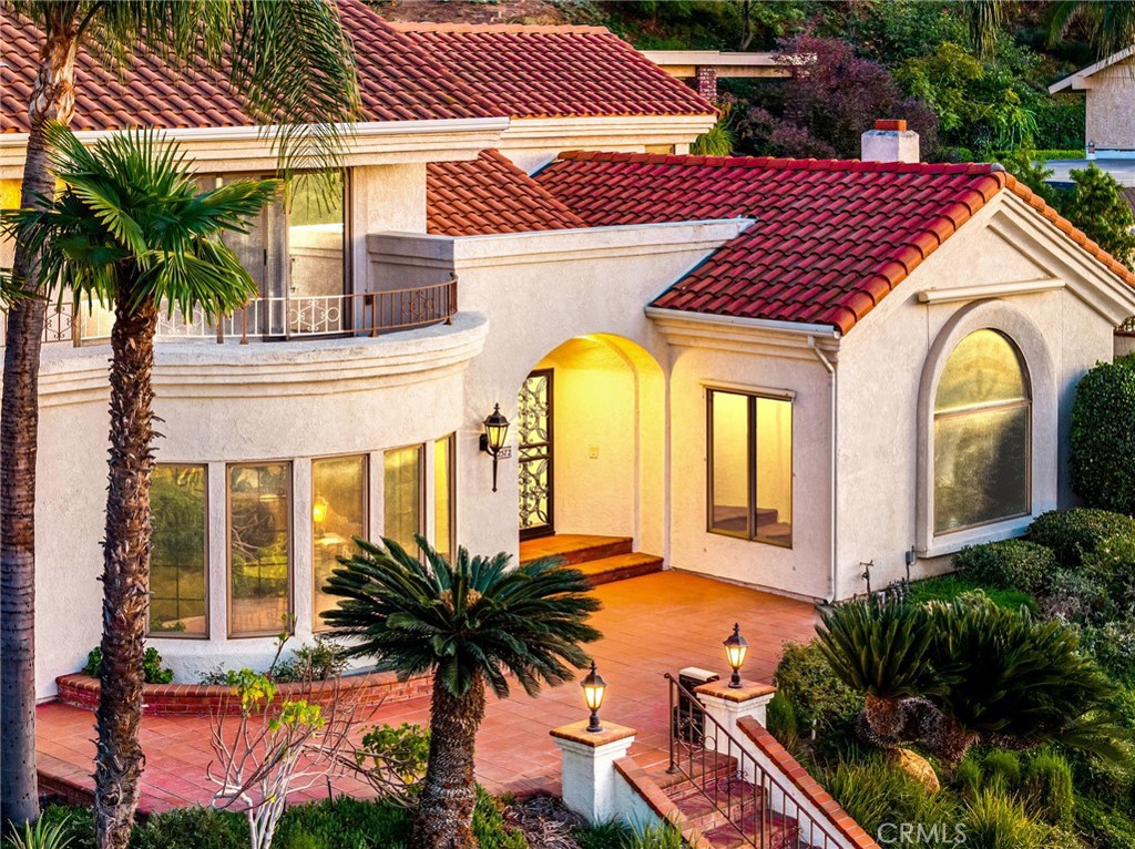 2572 Sunset Drive Riverside, CA 92506 - Photo 12 of 63 a front view of a house with a garden