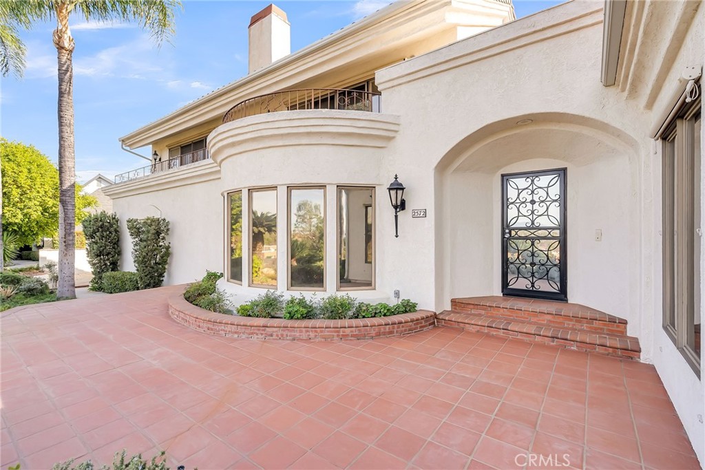 2572 Sunset Drive Riverside, CA 92506 - Photo 13 of 63 a front view of a house with garden