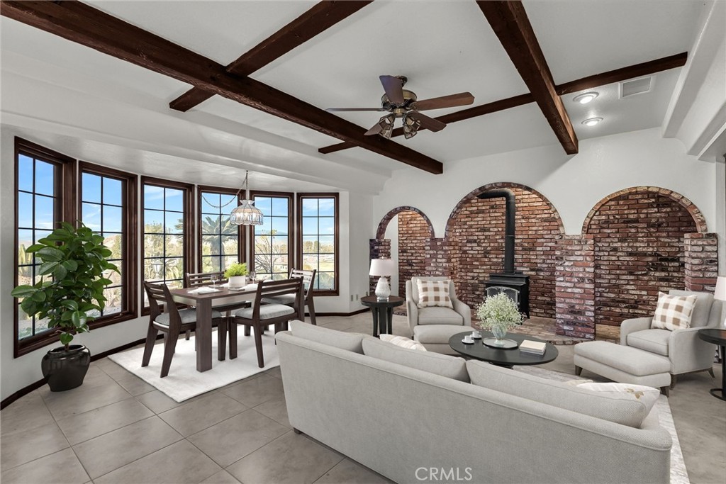 2572 Sunset Drive Riverside, CA 92506 - Photo 17 of 63 a living room with fireplace furniture and a large window