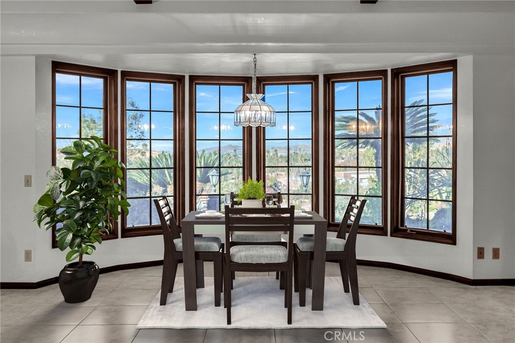 2572 Sunset Drive Riverside, CA 92506 - Photo 18 of 63 a dining room with furniture and window