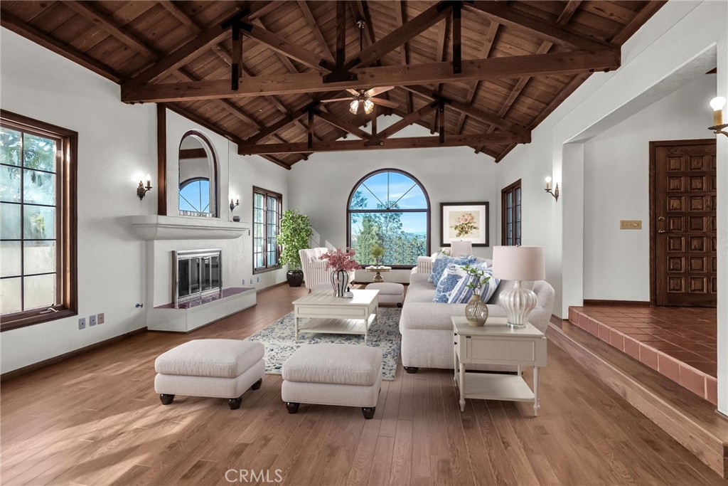2572 Sunset Drive Riverside, CA 92506 - Photo 24 of 63 a living room with fireplace furniture and a wooden floor