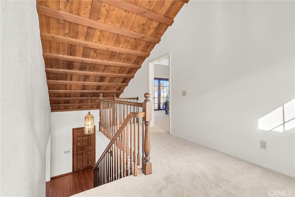 2572 Sunset Drive Riverside, CA 92506 - Photo 28 of 63 a view of staircase with railing and white walls